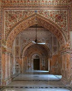 an ornate archway in the middle of a building