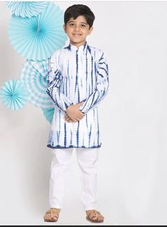 *Please visit our Etsy shop for full range of available items: https://www.etsy.com/shop/ayaandesignstudio/?etsrc=sdt Product Details Blue and white tie dye straight cotton knee length kurta, has a mandarin collar, button placket, long sleeves, straight hem and side slits. comes with white solid pyjama, has elasticated waistband. Material & Care Top Fabric: Pure Cotton Dry Clean preferably or cold light wash Specifications Sleeve Length - Long Sleeves Top Shape - Straight Top Length - Knee Length Neck - Mandarin Collar Print or Pattern Type - Bandhani, Dyed, Tie & Dye*Please note: - Sizing may run a size larger than  standard sizes, please refer to the sizing charts for sizing. - Please contact me if you have any questions *We are proud to provide you with high quality fabric, handpicked m Light Blue Cotton Long Sleeve Sets, White Cotton Traditional Wear For Spring, Light Blue Cotton Kurta For Diwali, Light Blue Cotton Sets For Diwali, Light Blue Cotton Diwali Sets, Blue Cotton Long Sleeve Sets, Diwali Light Blue Cotton Sets, Light Blue Cotton Kurta With Long Sleeves, Multicolor Cotton Tops For Eid