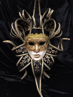 Handmade papier-mache mask hand-decorated with acrylic and gold leaf colors and fabric decorations.It can be worn through laces or as a decoration in the house.Measurements about 42 cm x 62 cmAll our masks are handmade by our staff (me, my wife and our collaborators) in our atelier in Venice. The masks are all made of paperweight and are made using ancient techniques from the 1300sThey are decorated with acrylic colors, gold leaf, silver leaf, trifies, lace and Swarovski crystals so as to make t Artistic Costume Masks For Festivals, Artistic Masks For Festivals And Costume Parties, Artistic Masks For Costume Festivals, Artistic Masks For Costume Party And Festivals, Traditional Theater Masks For Festivals, Traditional Masks For Theater And Festivals, Traditional Masks And Prosthetics For Theater Festivals, Traditional Theater Masks And Prosthetics For Festivals, Fantasy Masks For Carnival And Festivals