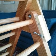 a close up of a wooden chair with keys on it