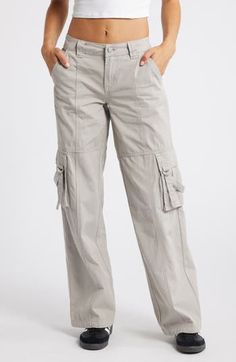 Keep it kicked back and carry on with trend-right cargo pants cut from sturdy cotton in a roomy fit. 32" inseam; 22" leg opening; 10" front rise; 14" back rise Zip fly with button closure Front slant pockets; cargo flap-patch pockets 100% cotton Machine wash, line dry Imported Cotton Cargo Pants, School Wear, Carpenter Pants, Maternity Shops, Designer Clothes For Men, Denim Jumpsuit, Women's Summer Fashion, Athletic Women, Paloma