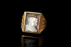 This is a very beautiful, old and unique ART DECO STYLE 14K GOLD CAMEO c. 1930 men ring size 10 (weight 10.4g). The ring has marvelous carved cameo (15 x 11 mm) with double portrait warrior with 14K gold . The bottom has 14K. The ring has a very extravagant and elegant feel to it and is in very good condition. 0.7 BR Antique Intaglio Signet Ring Collectible, Gold Cameo Signet Ring Collectible, Gold Signet Ring With Cameo Collectible, Formal Gold Cameo Signet Ring, Gold Cameo Signet Ring 14k, Antique Cameo Signet Ring Collectible, Collectible Art Deco 14k Stamped Signet Ring, Warrior Men, Men Signet Ring