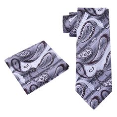 Elegance Redefined: The Majestic Light Grey and Rich Brown Paisley Necktie In the realm of men's fashion, a necktie is more than just an accessory; it's a canvas upon which personal style is elegantly expressed. If you're drawn to intricate patterns that exude sophistication, allow us to introduce you to the Light Grey and Rich Brown Paisley Necktie. This remarkable accessory seamlessly blends the refined hues of light grey and rich brown with an intricate paisley pattern, creating a captivating Charcoal Gray Suit, Light Blue Dress Shirt, Paisley Color, Refined Fashion, Brown Paisley, Brown Tie, Confident Style, Paisley Tie, Brown Suits