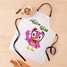 an apron that has a cartoon character on it and is next to some utensils