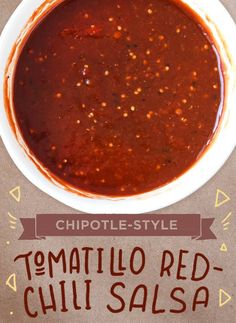 chili sauce in a white bowl on top of a brown paper bag with the words chipotle - style tomato red chili salsa