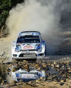 France's driver Sebastian Ogier and and co-driver Julien Ingrassia steer their Wolkswagen Polo WRC during the seventh stage of today's special stages of the FIA World Rally Championship of Italy near Monte Lerno around 20 kilometres southwest of Olbia on the Italian island of Sardinia, on June 21, 2013. AFP PHOTO / ANDREAS SOLARO Retro Rally, World Rally Championship, Polo Gti, Red Dead, Steam Engine