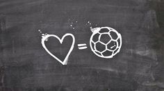 a chalk drawing of a soccer ball and a heart