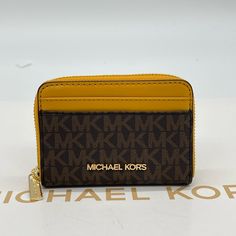 Brand New With Tag Michael Kors Jet Set Travel Md Za Card Case Color: Marigold Gold Tone Logo And Hardware 2 Exterior Front Card Slots 2 Exterior Back Credit Card Slots 4 Interior Credit Card Slots Apprx Dimensions 4.5w X 3.25h X 1d Travel Gold Coin Purse With Interior Card Slots, Travel Coin Purse With Interior Card Slots In Gold, Travel Coin Purse With Card Slots In Gold, Gold Leather Card Holder With Interior Slots, Gold Bifold Coin Purse For Everyday Use, Daily Use Gold Coin Purse With Card Slots, Gold Bifold Coin Purse, Michael Kors Gold Wallet For Everyday Use, Gold Michael Kors Wallet For Everyday Use