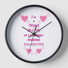 a white clock with pink hearts on it and the words i'm a proud mom of a missing awesome daughter