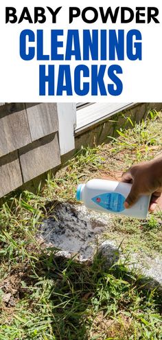 a person using a spray bottle to remove baby powder from the ground