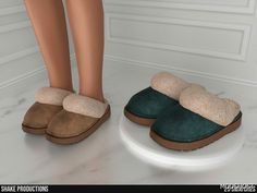 a pair of women's slippers on top of a white counter next to a woman's legs