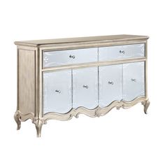 an antique style dresser with mirrored drawers