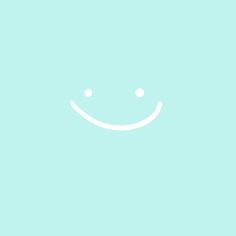 a blue background with a smiley face drawn on it