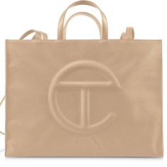 Telfar Cream Medium Shopping Bag Brand New With Tag And Proof Of Purchase Top Handle Tan Bag For Shopping, Tan Top Handle Bag For Shopping, Tan Top Handle Shopping Bag, Tan Bag With Detachable Handle, Tan Bags With Detachable Handle, Tan Bags With Detachable Handle For Shopping, Tan Shopping Bag With Detachable Handle, Tan Shopping Bags With Double Handle, Telfar Cream