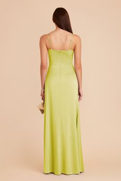 the back of a woman wearing a lime green dress