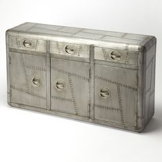 an old metal cabinet with four drawers and knobs on the doors is isolated against a white background