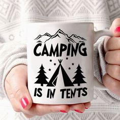 a woman holding a coffee mug that says camping is in tents