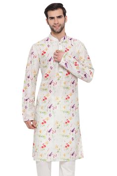 Floral Printed Cotton Cream Kurta Spring Designer Cotton Silk Kurta, Traditional Cotton Silk Kurta For Spring, White Cotton Sherwani For Spring, Long Sleeve Multicolor Cotton Silk Kurta, Multicolor Cotton Silk Straight Kurta, Spring Cotton Silk Kurta With Printed Motifs, Festive Cotton Sherwani With Printed Motifs, Fitted Multicolor Cotton Sherwani, Cotton Sherwani With Printed Motifs And Long Sleeves