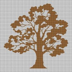 a cross stitch tree with brown leaves