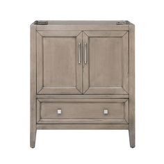 an antique style cabinet with two drawers and one door on the bottom, in grey wood