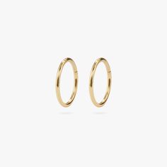 This clicker is the perfect minimalist foundation to your earscape. Minimalist Internally Threaded Huggie Septum Ring, Everyday Hypoallergenic 14k Gold Septum Ring, Minimalist Internally Threaded Yellow Gold Septum Ring, Hypoallergenic Yellow Gold Septum Ring For Everyday, Everyday Hypoallergenic Yellow Gold Septum Ring, Lobe Piercings, Lobe Piercing, Daith Piercing, Pearl Set