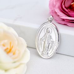 "Sterling silver Miraculous Medal necklace charm, high quality unisex Miraculous Medal necklace, gold filed Our Lady of Grace charm pendant Sterling silver 925 Miraculous Medal with rhodium plated protection. This medal is made with special \"coin\" technology so each detail is very well exposed and precise. Edge of this medal is diamant cuted so it gives to medal shiny and glossy look. In order to find ideal medal for everyone we can offer variation of six different sizes. Our recommendation is Gift Coin Pendant Charm, Silver Tarnish-resistant Round Pendant Charm, Silver Tarnish Resistant Charms For Gift, Silver Tarnish-resistant Charms For Gifts, Sterling Silver Tarnish Resistant Charms, Tarnish Resistant Sterling Silver Charms, Silver Necklace With Miraculous Medal For Gift, Silver Necklace With Miraculous Medal As Gift, White Gold Necklace With Miraculous Medal For Gift