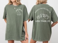 Copy/paste the link in your browser to Join our VIP club for exclusive offers: https://shop.activealluredesigns.com/ Get ready for the ultimate bachelorette adventure with our custom Camp Bach shirt, sweatshirt or hoodie! Perfect for celebrating the bride-to-be in style, this shirt is personalized with her name, your camp name, and the year of your unforgettable trip. Whether you're heading to the woods, the lake, or just having a fun weekend getaway, this comfy and stylish shirt is a must-have Green Summer Top For Camping, Summer Green Top For Camping, Cabin Bachelorette Party, Cabin Bachelorette, Camp Bach, Best Weekend Getaways, Lake Cabin, Vip Club, Lake Cabins