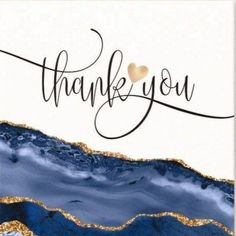 a card with the words thank you written in black ink and gold foil on it