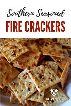 a white plate topped with crackers covered in cheese