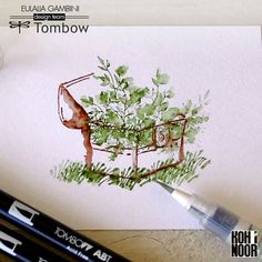 a drawing of a potted plant on top of a piece of paper next to a marker