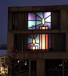 a building with a stained glass window in it