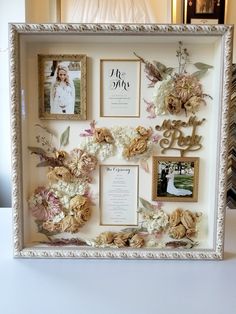 a white frame filled with pictures and flowers