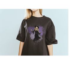 a woman wearing a harry potter t - shirt with the image of her on it