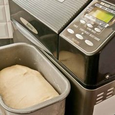 a loaf of bread is sitting next to a machine