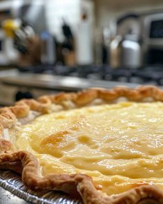 a pie sitting on top of a metal pan