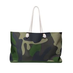 "Introducing the \"Urban Operator\" Camo Tote Bag, the ultimate accessory for the fashion-forward individual with a flair for the bold and the practical. Seamlessly combining utilitarian design with urban style, this tote bag features a classic camouflage pattern in a contemporary color blend, making it an ideal choice for those who appreciate a military-inspired aesthetic. .: One size: 24\" x13\" (60.9 cm x 33 cm) .: 100% Spun Polyester .: T-bottom .: Cream sheeting interior lining .: NB! Size Grey Bag, Denim Purse, Grey Jeans, Military Inspired, Color Blending, Leather Cord, Urban Fashion, Camouflage, Camo