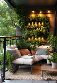 an outdoor living area with plants and lights on the wall, including potted plants