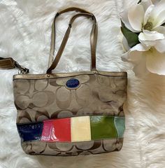 Authentic Coach Signature Canvas & Leather Tote Bag Multi Color # F1068. Condition is "Pre-owned". Shipped with USPS Priority Mail. Canvas Leather Tote Bag, Canvas Leather Tote, Tan Handbags, Coach Crossbody Purse, Buckle Bags, Brown Purses, Black Leather Purse, Black Leather Tote, Signature Canvas