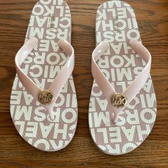 These Flip-Flops Are From Michael Kors. They Are A Pink Color. They Are Brand New Without Tags. They Have Light Wear. They Include The Michael Kors Logo Clip On The Front Of The Flip-Flop. They Are A Size 8. They Were Worn A Few Times This Past Summer Please Send Questions If Needed. Flip Flops Michael Kors, Pink Flip Flops, Michael Kors Logo, Michael Kors Shoes, Flip Flop, Clip On, Women's Shoes Sandals, Pink Color, Flip Flops