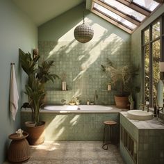 a bath room with a tub a sink and potted plants