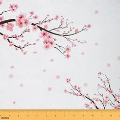 a white background with pink flowers on it and a measuring tape in front of it