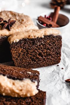 chocolate cake with frosting and cinnamon on top