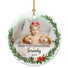 a baby's 2nd christmas ornament with an infant in a bathtub