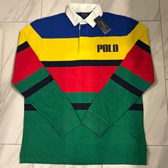 Men’s Polo Ralph Lauren Rugby Polo Long Sleeve Shirt Price Is Firm At $150. Condition: 10/10 New W Tags Multicolor Long Sleeve Cotton Polo Shirt, Yellow Long Sleeve Cotton Polo Shirt, Fitted Green Long Sleeve Polo Shirt, Classic Multicolor Long Sleeve Tops, Ralph Lauren Shirts Men, Polo Outfit Men, Blue Couch, Ralph Lauren Rugby, Polo Outfit