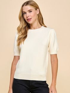 50% Rayon, 28% Nylon, 22% Polyester Round Neckline Short Puff Sleeves Fitted Knit Material Add this staple piece to your wardrobe today! Our Cara Sweater top is an essential & perfect for any season! Features a round neckline & short puff sleeves, giving the top a nice feminine touch. You can dress this top up or down. For a casual look, pair with denim, simple jewelry & flats. For a chic business look, pair under a blazer with tailored trousers, gold jewelry & heels. 📦 Free standard shipping o Business Look, Simple Jewelry, Tailored Trousers, Staple Pieces, Knitting Materials, Vintage Tops, Vintage Charms, Puff Sleeves, Round Neckline