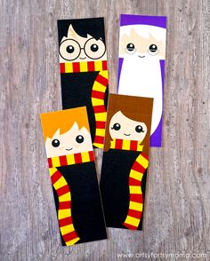 three harry potter socks with faces on them