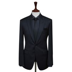 Benefits of Choosing our Dark Navy Blue Suit Our tailors stitch to deliver the finest quality with superior fit as per your requirements. We have a catalog full of bespoke suiting designs where you can choose the suit design. If you don’t find what you are looking for. You can go with your own choice of suiting elements. Where you can choose suit lapels, buttons, jacket style, and a number of buttons on cuffs with your monogram embarrassed on the jacket cuff. A bespoke suit is not only giving yo Navy Tuxedo With Suit Collar In Suiting Fabric, Navy Notch Lapel Tuxedo In Suiting Fabric, Navy Double-breasted Tuxedo Suit, Navy Tuxedo With Suit Collar For Business, Navy Fitted Suit And Tie Accessories, Navy Fitted Suiting Fabric Accessories, Navy Tuxedo In Suiting Fabric For Business, Navy Business Tuxedo In Suiting Fabric, Navy Tailored Suit