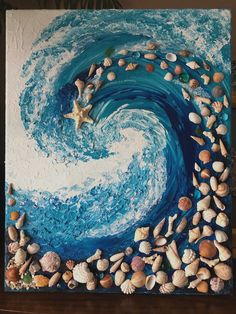 a painting with seashells and starfish on it