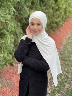 Our Modish Girl Premium Jersey hijab-Ivory is a high-quality, light-weight cotton jersey fabric. This luxurious Jersey wrap is the perfect complement to your daily look and a comfortable fit that will help make you feel stylish and confident. Fabric: Cotton, Lycra, Viscose Dimension: 60”x20” Contour: Long Rectangle Thickness: Medium Texture: Smooth Care: Machine or hand wash in warm water, tumble dry or air dry, iron if needed. Stylish Hijab, Jersey Hijab, Muslim Women Hijab, Cotton Jersey Fabric, Muslim Women, Daily Look, Hijab Fashion, Fabric Cotton, Jersey Fabric