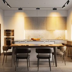 the kitchen is clean and ready to be used for dinner or lunchtime, while the dining table has been set up with four chairs